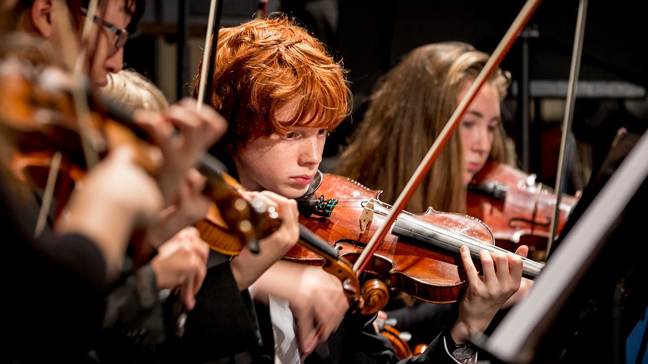 Music-at-Brighton-College-Strings-with-pupils.jpg