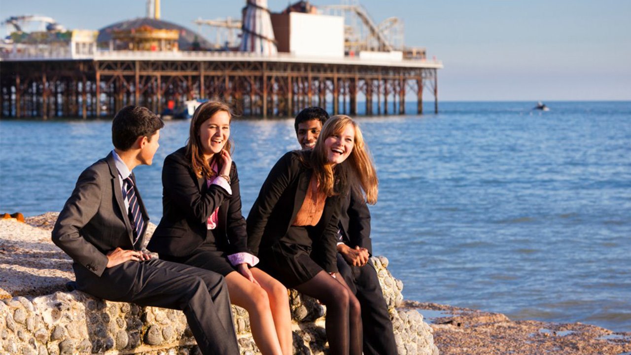 Brighton-College-co-ed-pupils-by-pier.jpg